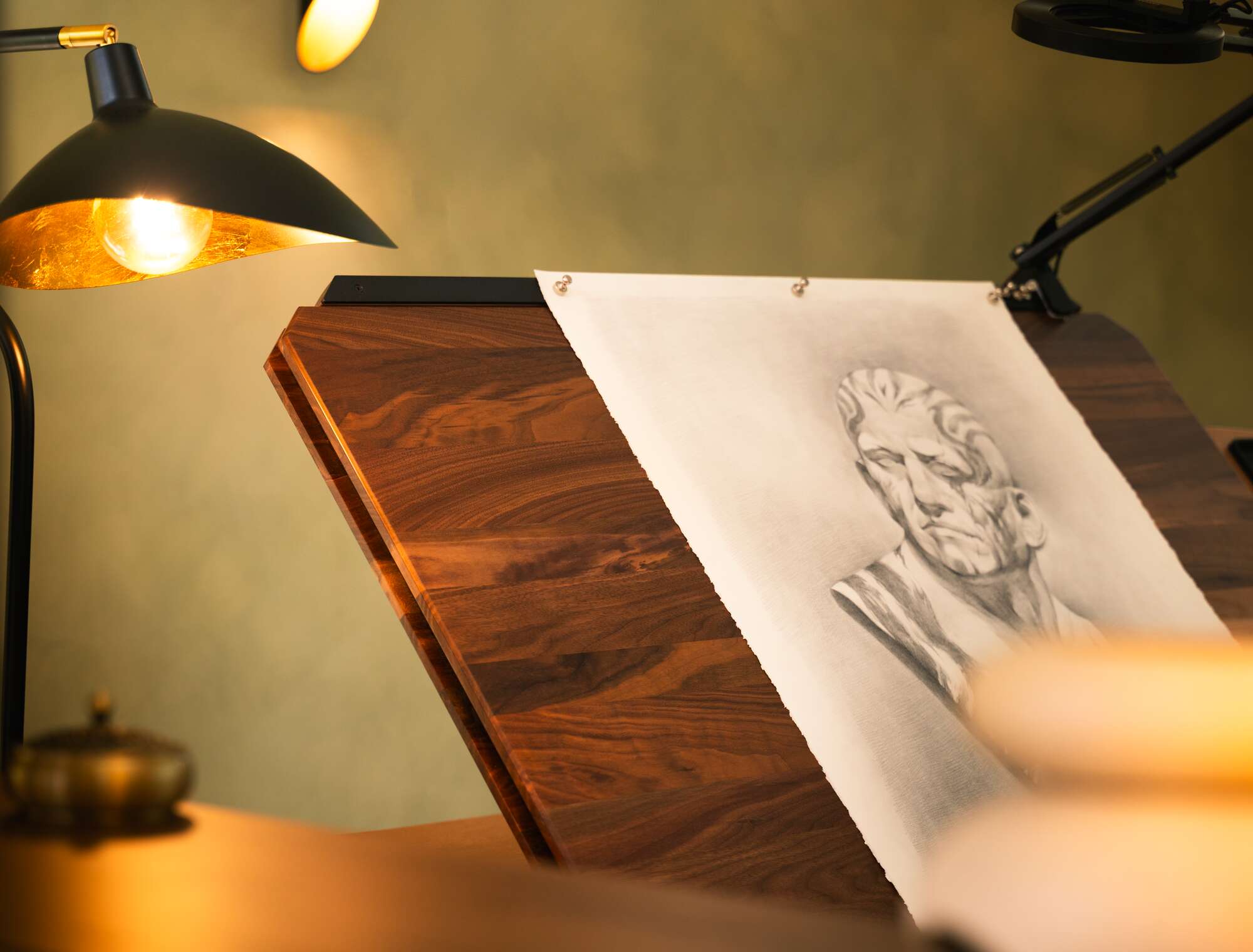 Desk Extension - drawing surface close-up under lamp